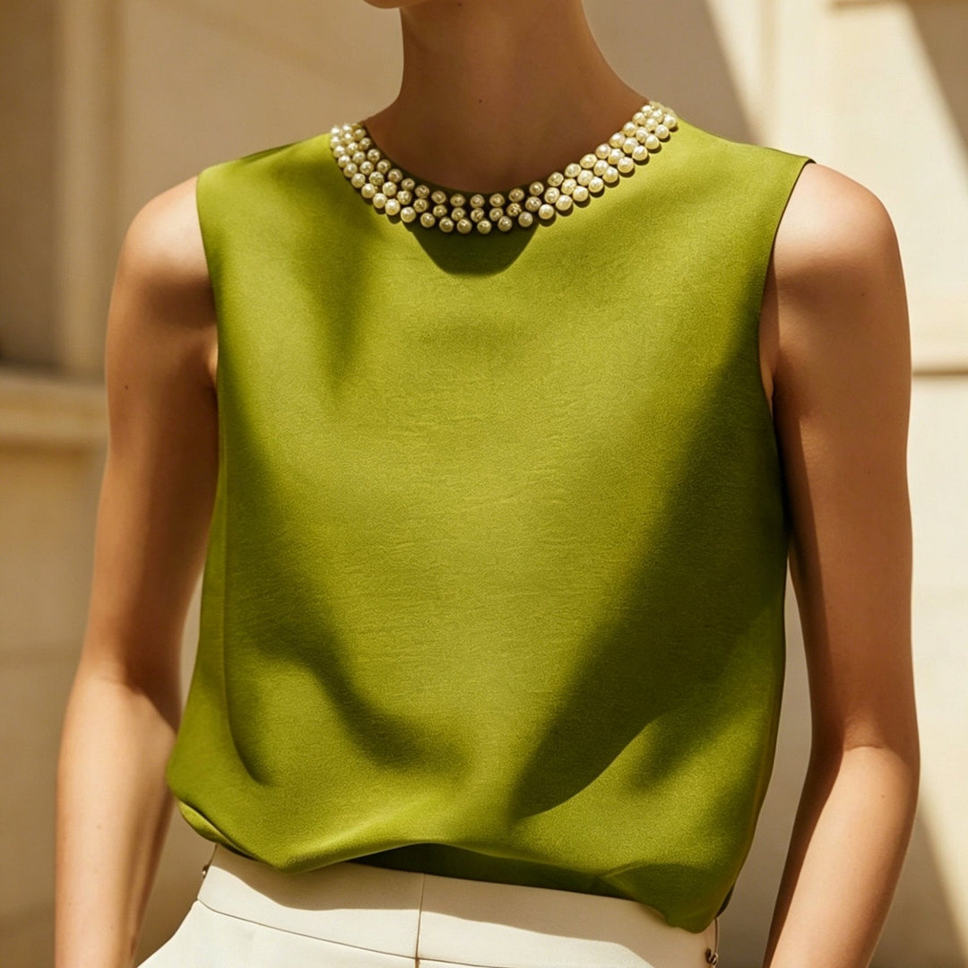 Sythove | Ärmellose Bluse mit dekorativen Perlen und elegantem Stil