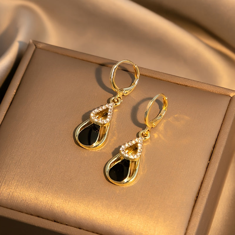 Ralia | Doppelte Tropfenohrringe mit durchbrochenem Design und elegantem Finish