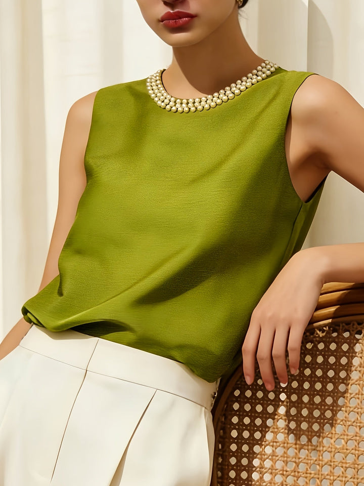 Sythove | Ärmellose Bluse mit dekorativen Perlen und elegantem Stil