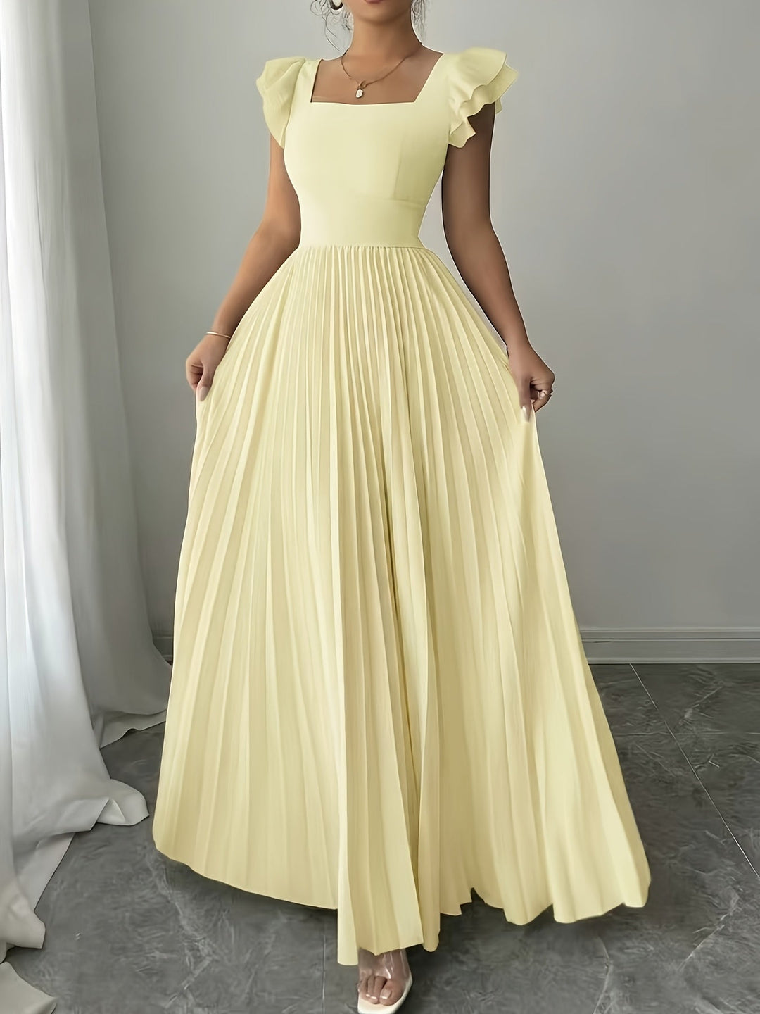 Oxeris | Langes Floral Kleid mit Falten und zeitloser Eleganz