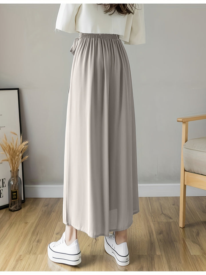 Caexine | Weitbeinige Hose mit Falten und Eleganter Schnitt