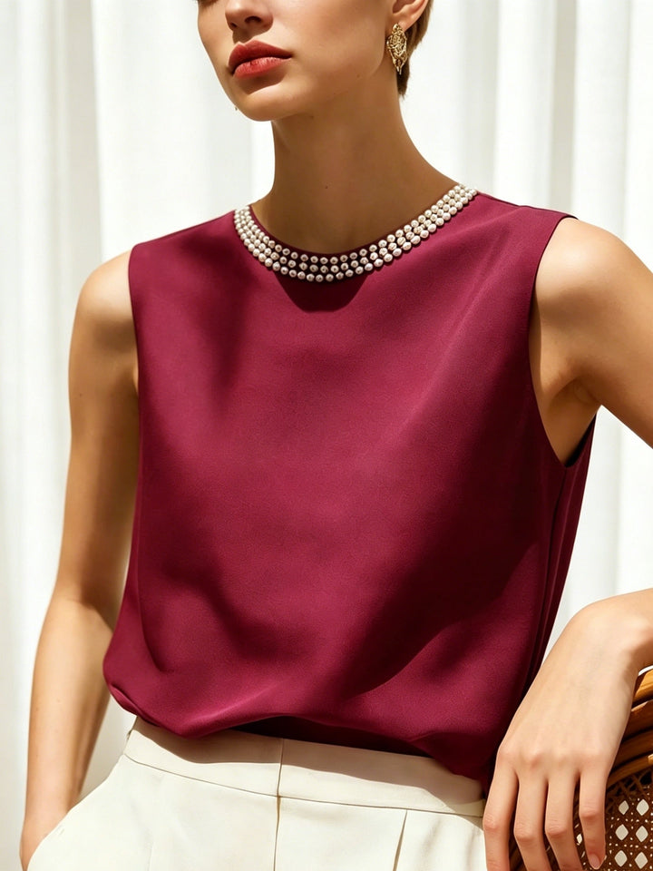 Sythove | Ärmellose Bluse mit dekorativen Perlen und elegantem Stil