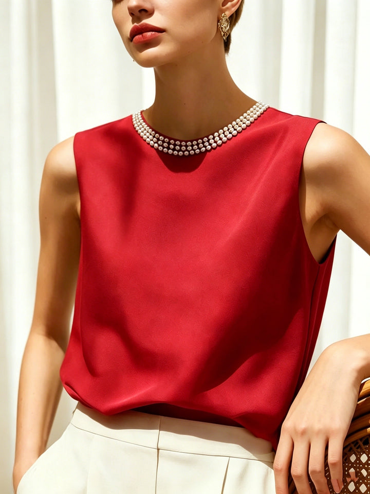 Sythove | Ärmellose Bluse mit dekorativen Perlen und elegantem Stil