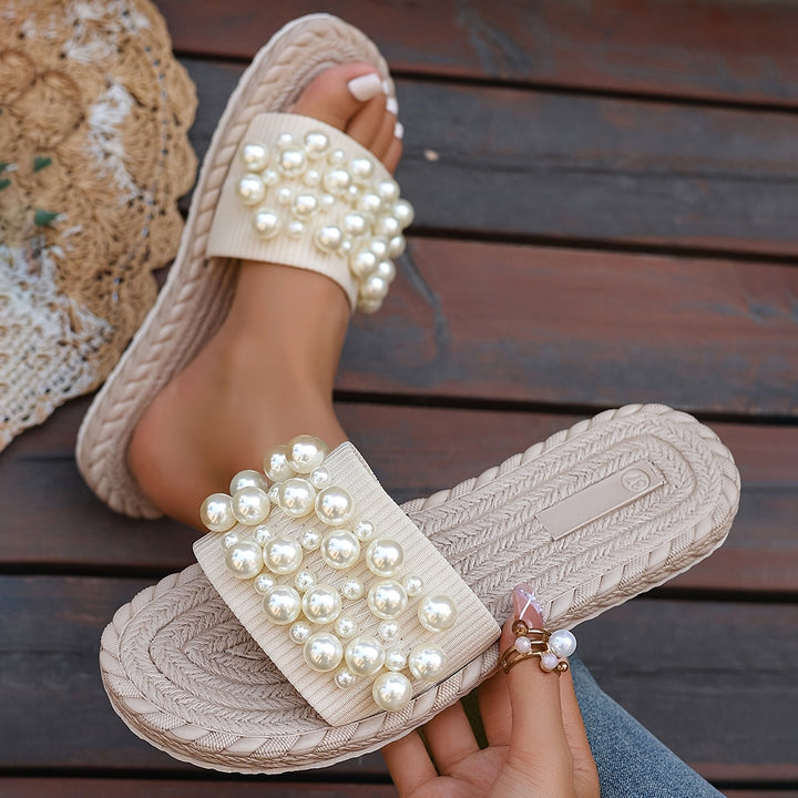 Fruxith | Flache Sandalen mit dekorativen Perlen und maximalem Komfort